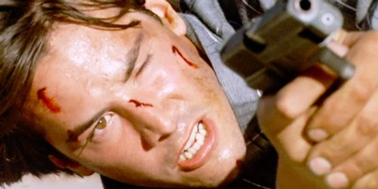 A bloodied Keanu Reeves in Point Break