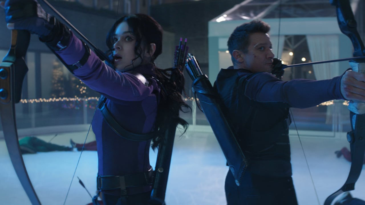 Hailee Steinfeld and Jeremy Renner with their weapons in Marvel's Hawkeye