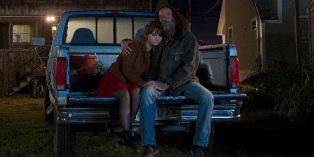 Ruby's father consoles her in the back of the truck in CODA
