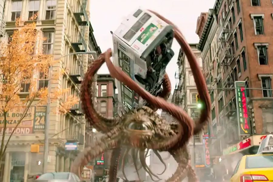 a bus is lifted by tentacles above the city street