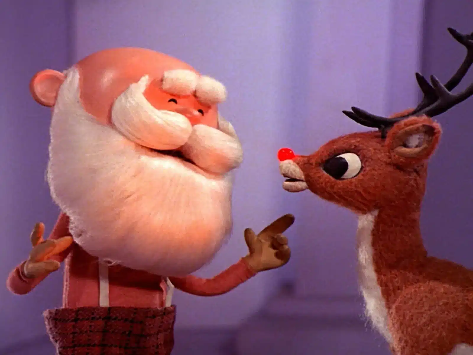 Santa talks to Rudolph the red-nosed reindeer
