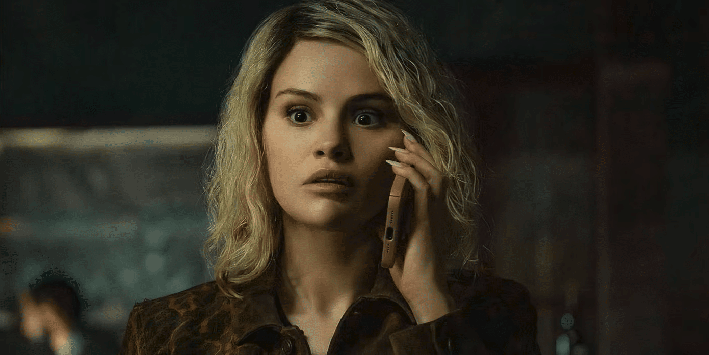 Jessi talking into a cellphone