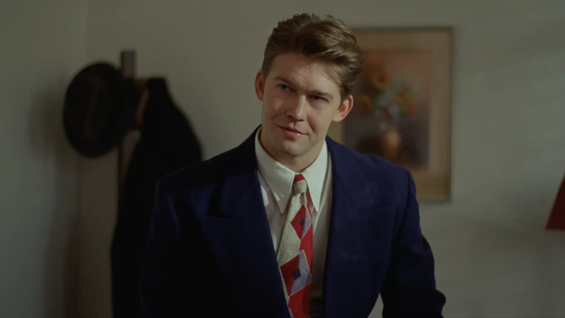 Harry Lee Van Buren dressed in an expensive suit with a colorful tie