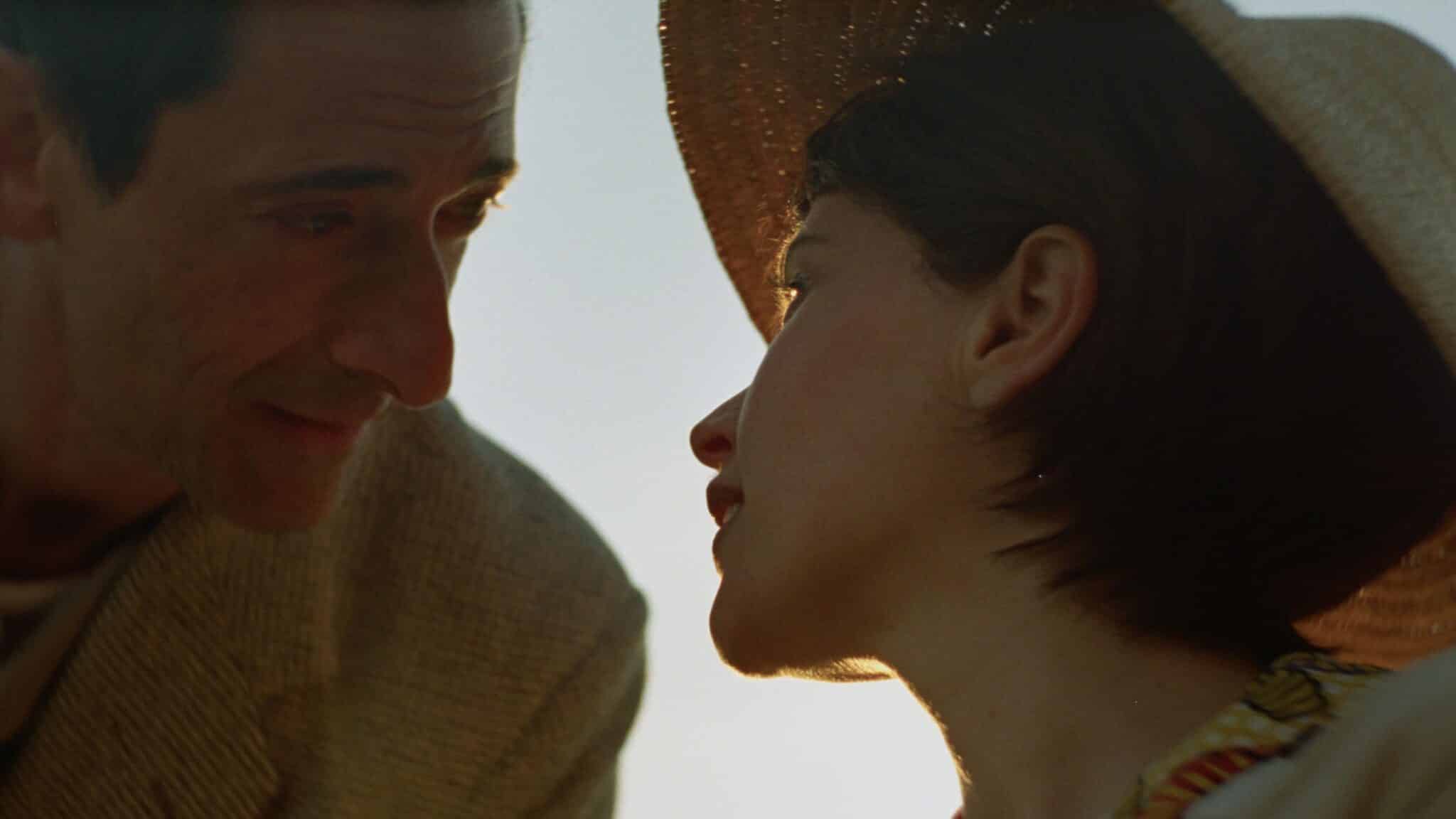 Lazlo and Erzsebet look at each other closely
