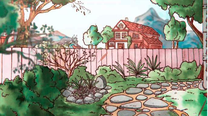 A garden with Moka the cat crawling atop a fence