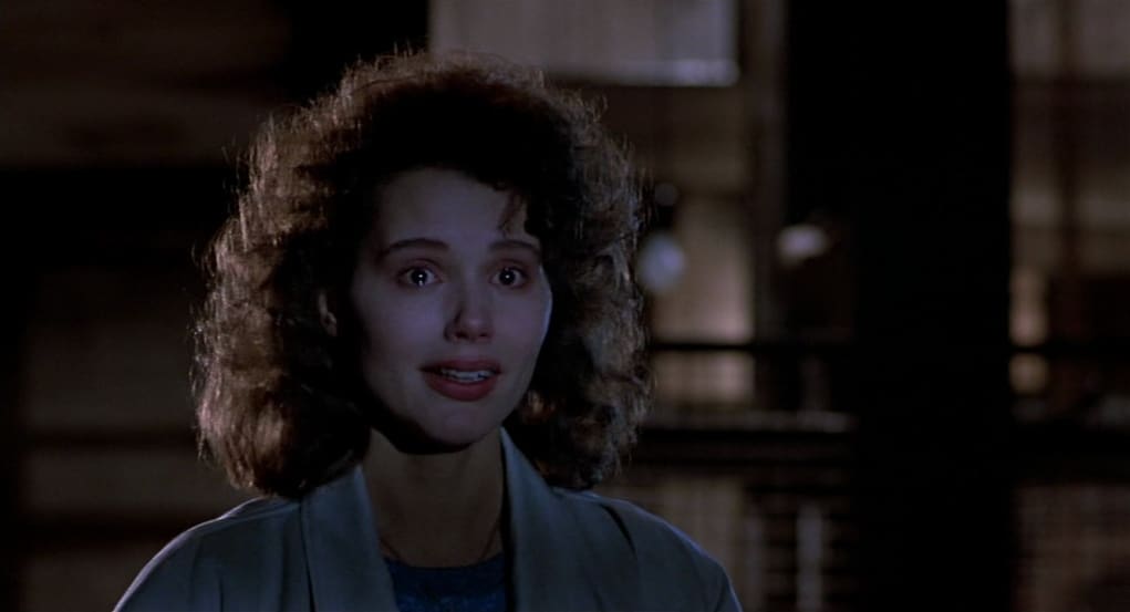 Geena Davis looking scared in The Fly