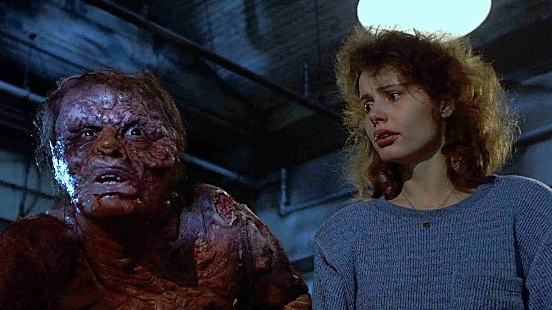 The transformed Jeff Goldblum and nicely dressed Geena Davis in The Fly