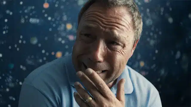 Eddie cries sitting on Jamie's bed