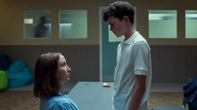 Jamey hovers over Briony in the interview room