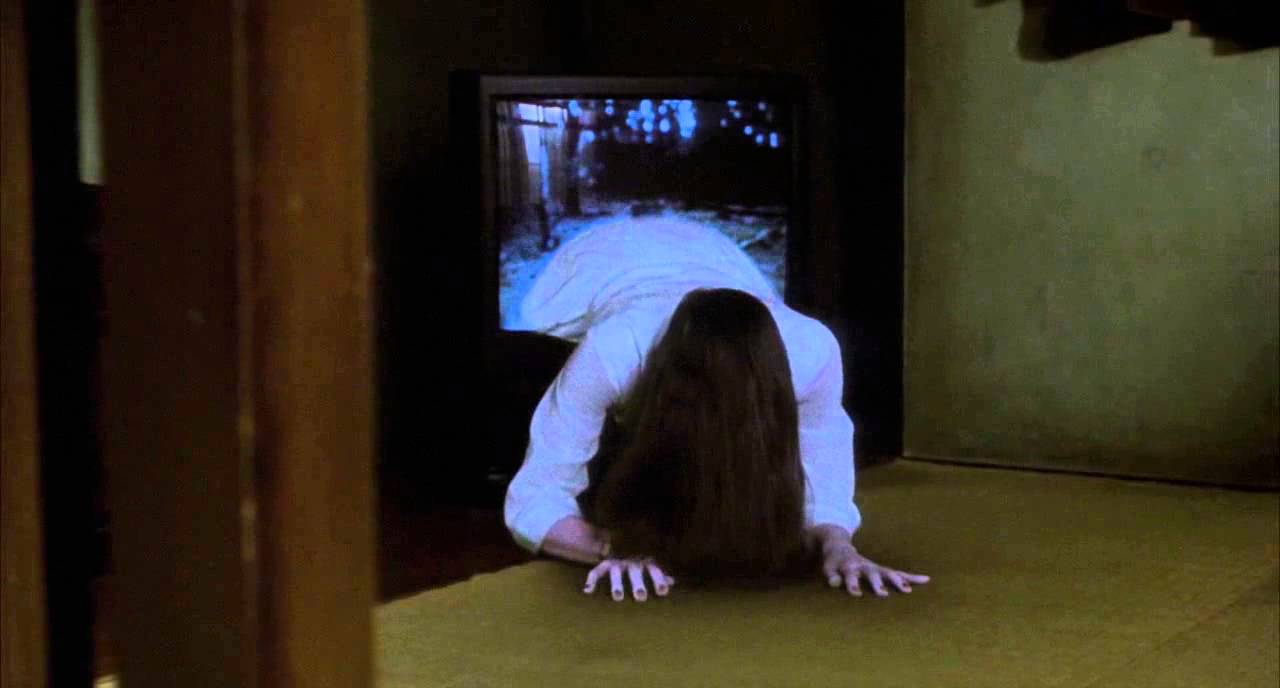 Sadako climbs out of the TV set