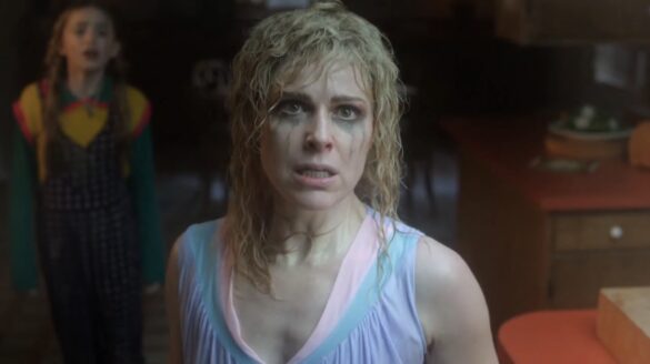 Karen Wheeler, hair a mess, eyeliner running down her cheeks