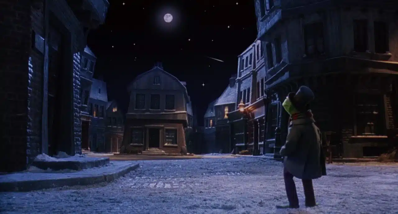 Kermit the Frog as Bob Cratchit on a dark snowy street
