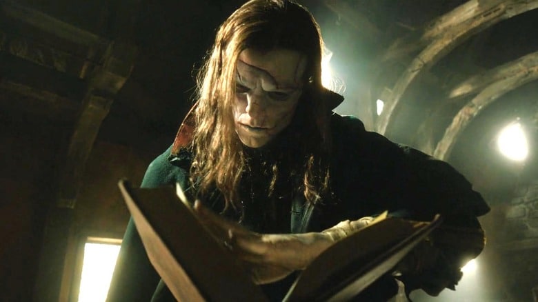 Frankenstein's creature reading a book