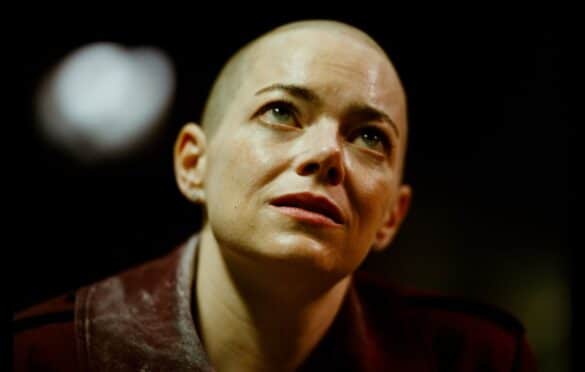 actress Emma Stone with her head shaved as Michelle in the film Bugonia