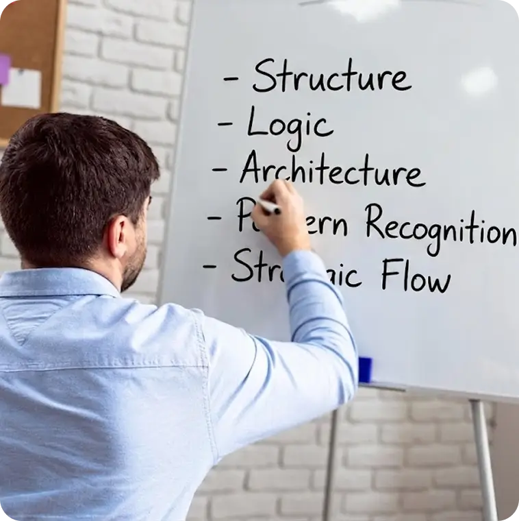 Man writing on a blackboard