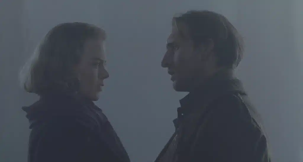 Grace faces Charles in the fog