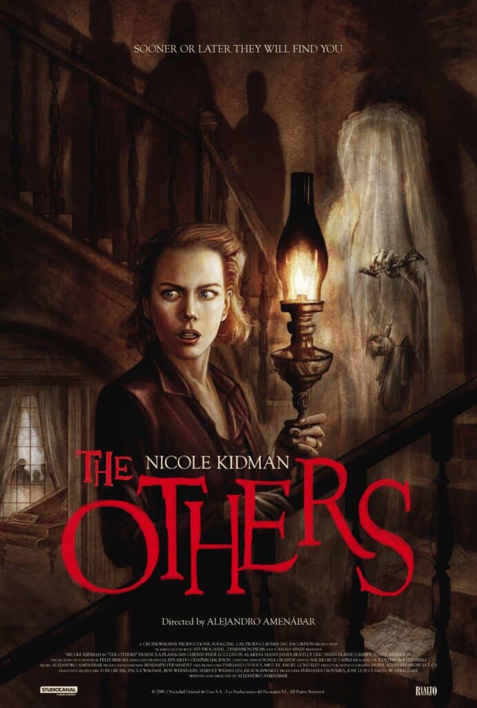The Others movie poster featuring Nicole Kidman holding a torchlight