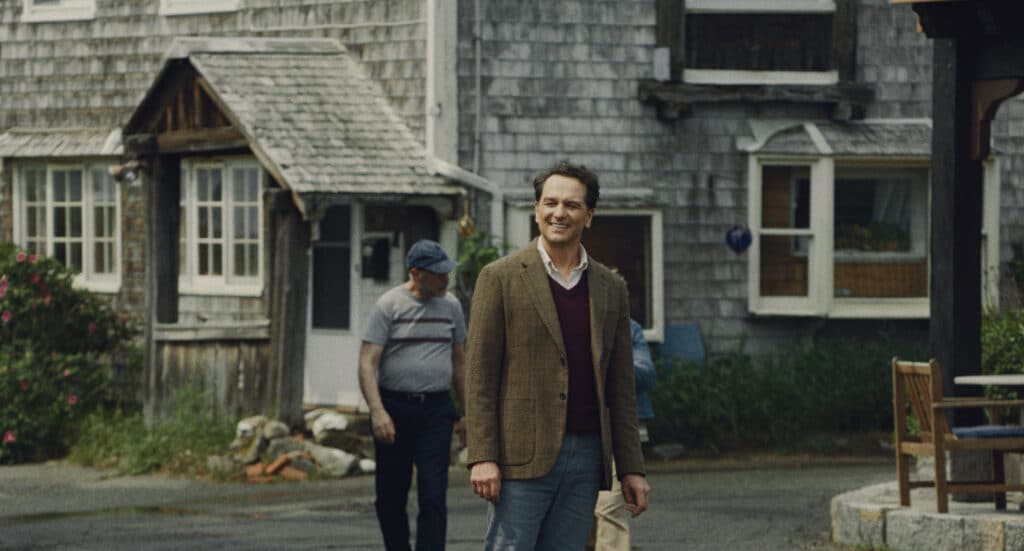 Tom Loftis stands on a street in Widow's Bay
